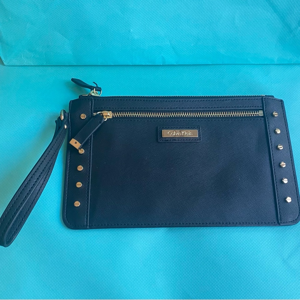 NWOT Calvin Klein Black and Gold Clutch.